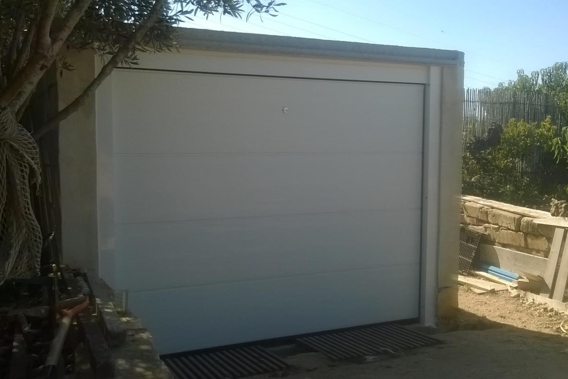 installed between walls, garage doors Malta
